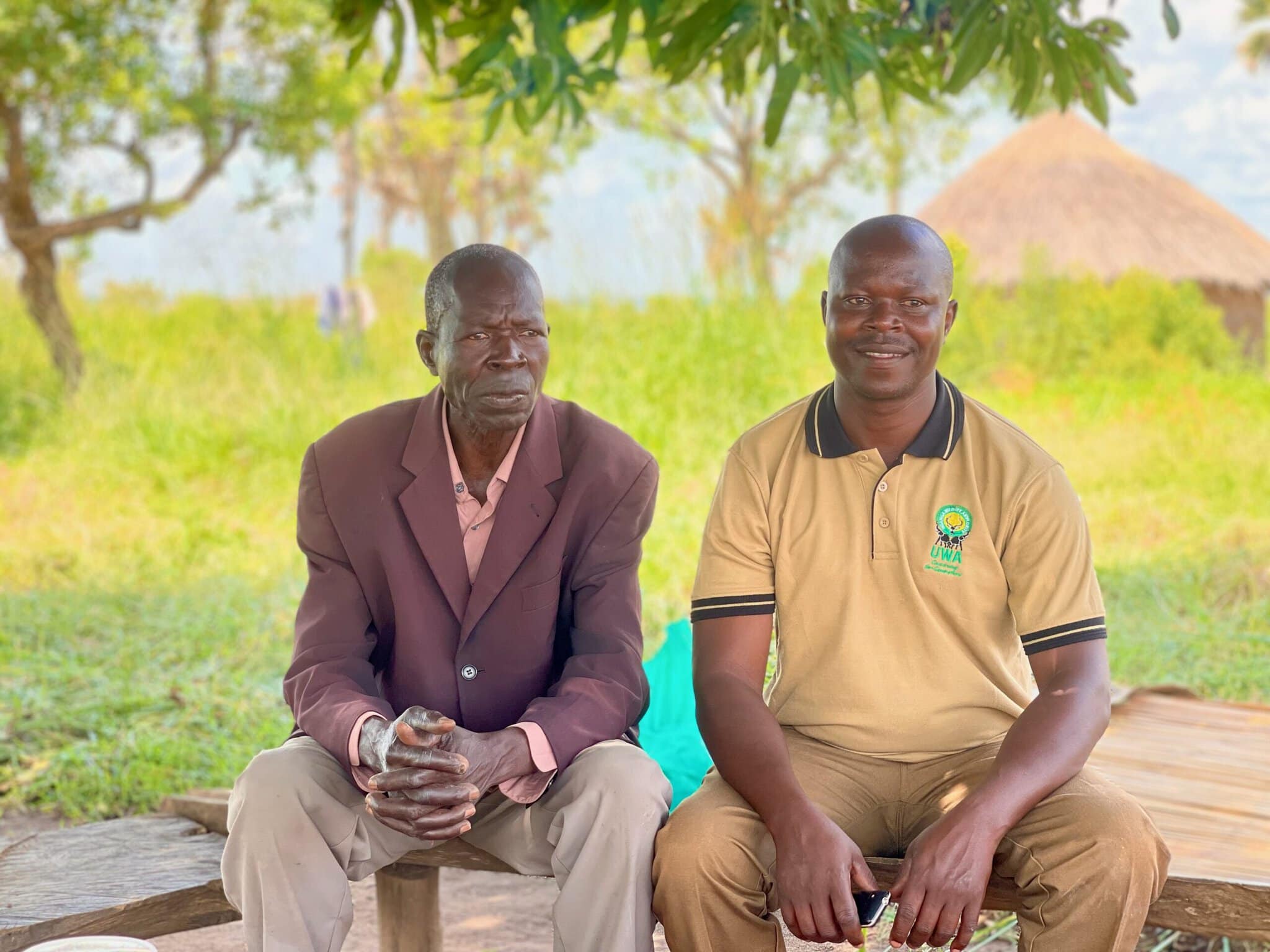 Anthony Opoka with his father, George, in Rwot Obillo | Mark Sullivan